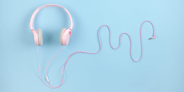 pink headphones on a blurred background 