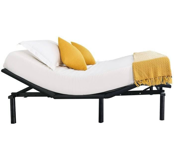Turmerry adjustable base A3 with raised head and foot, with white mattress, yellow pillows, and yellow throw blanket.